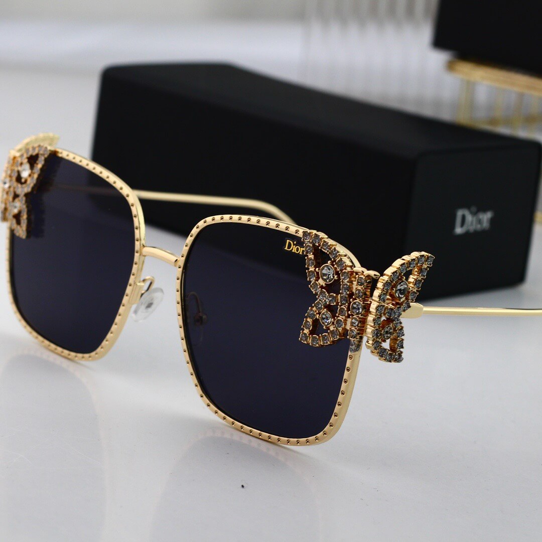 Gafas de sol de mariposa de metal de pasarela