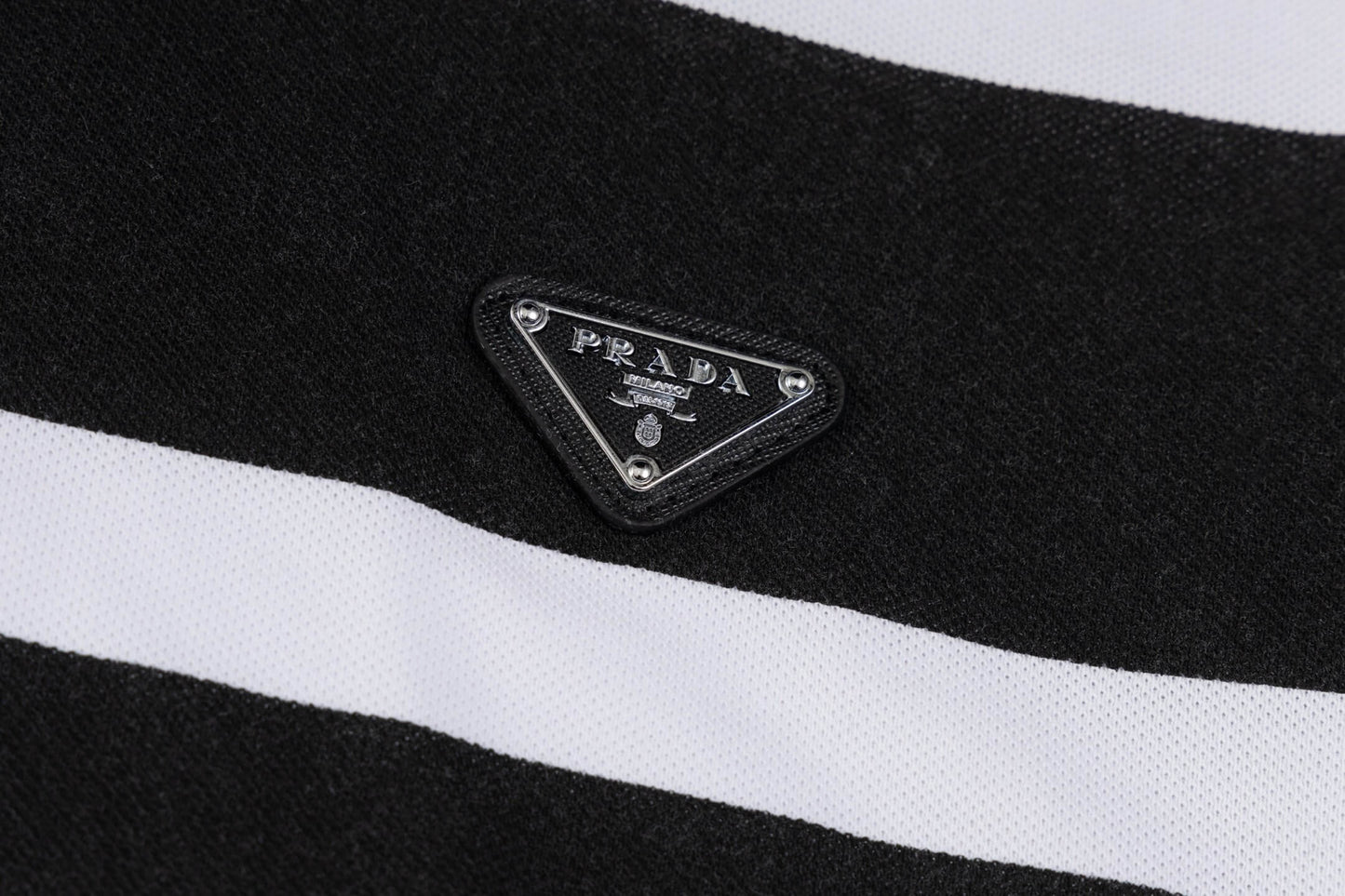 Polo à rayures et coutures