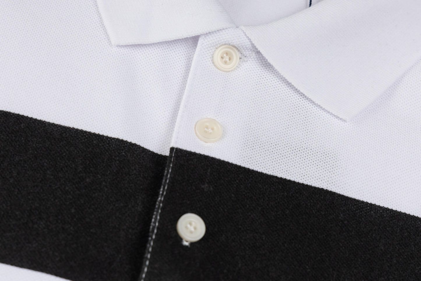 Polo à rayures et coutures