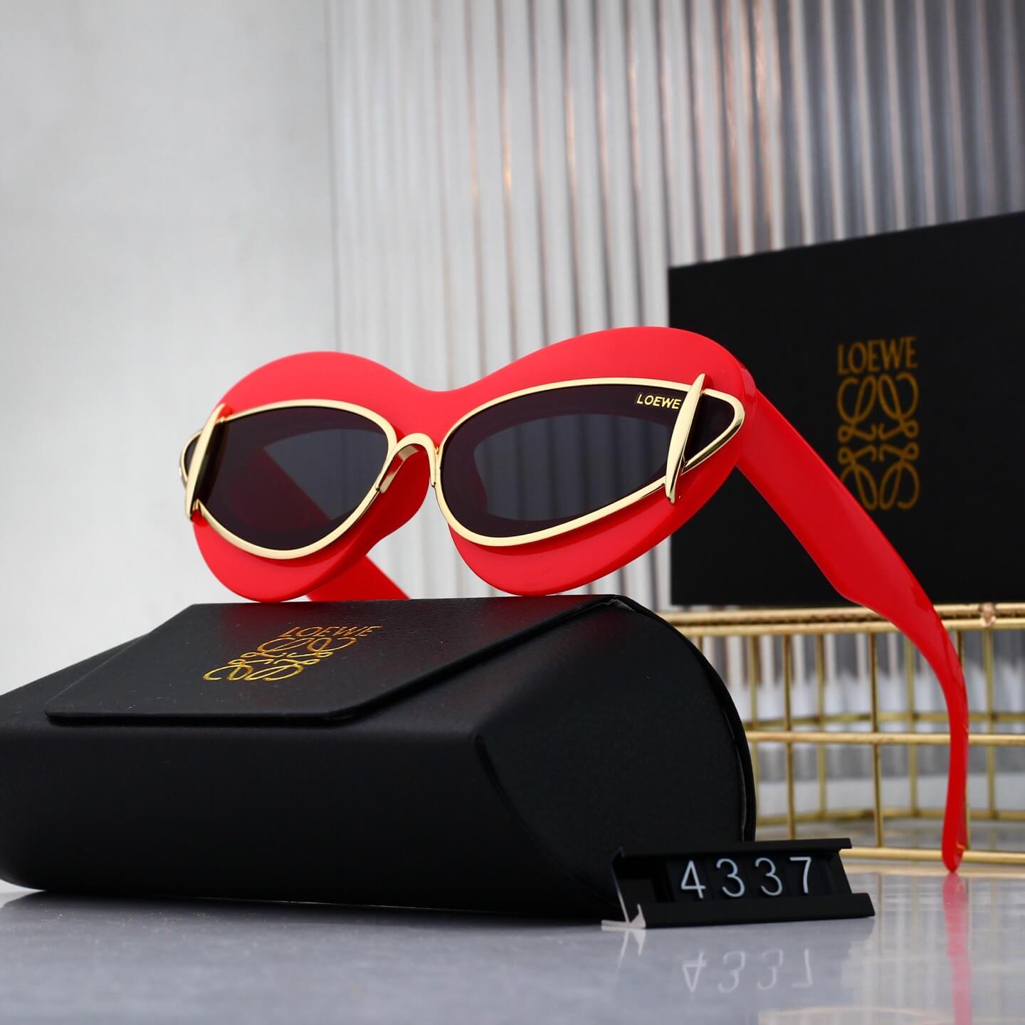 Lunettes de soleil rétro modernes à monture en cœur incrustée