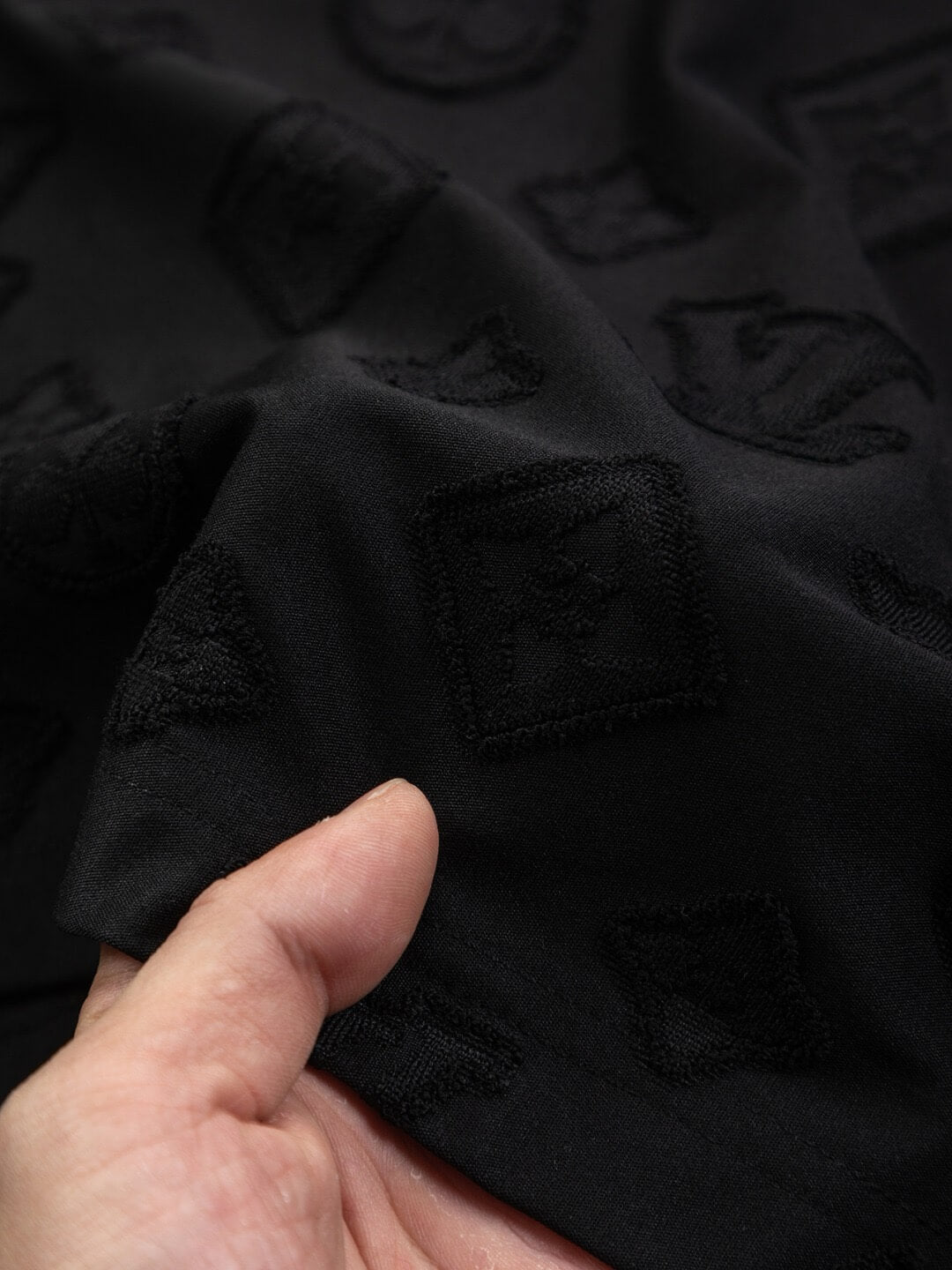 Camiseta llena de preguntas