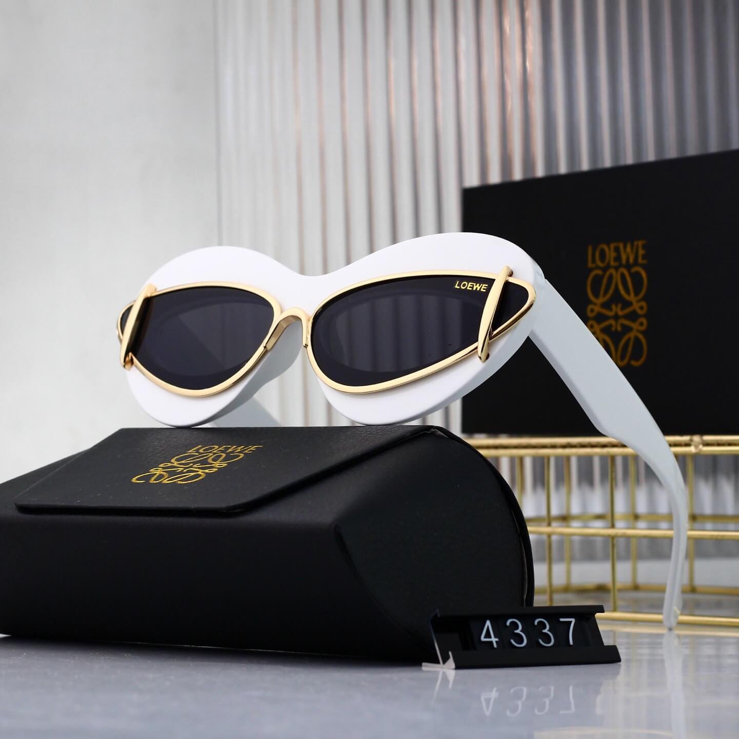 Lunettes de soleil rétro modernes à monture en cœur incrustée