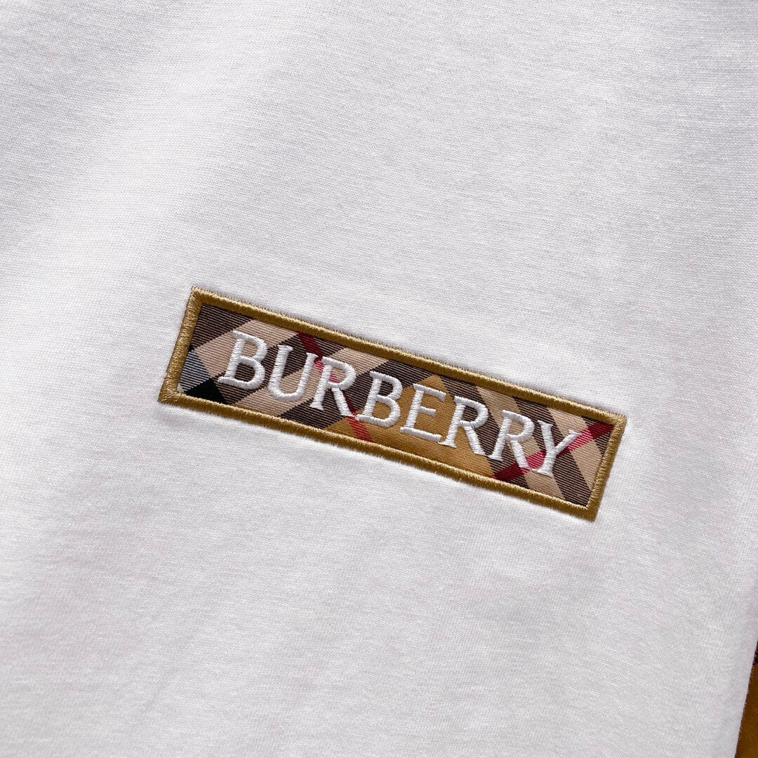 T-shirt à rayures à carreaux sur les manches
