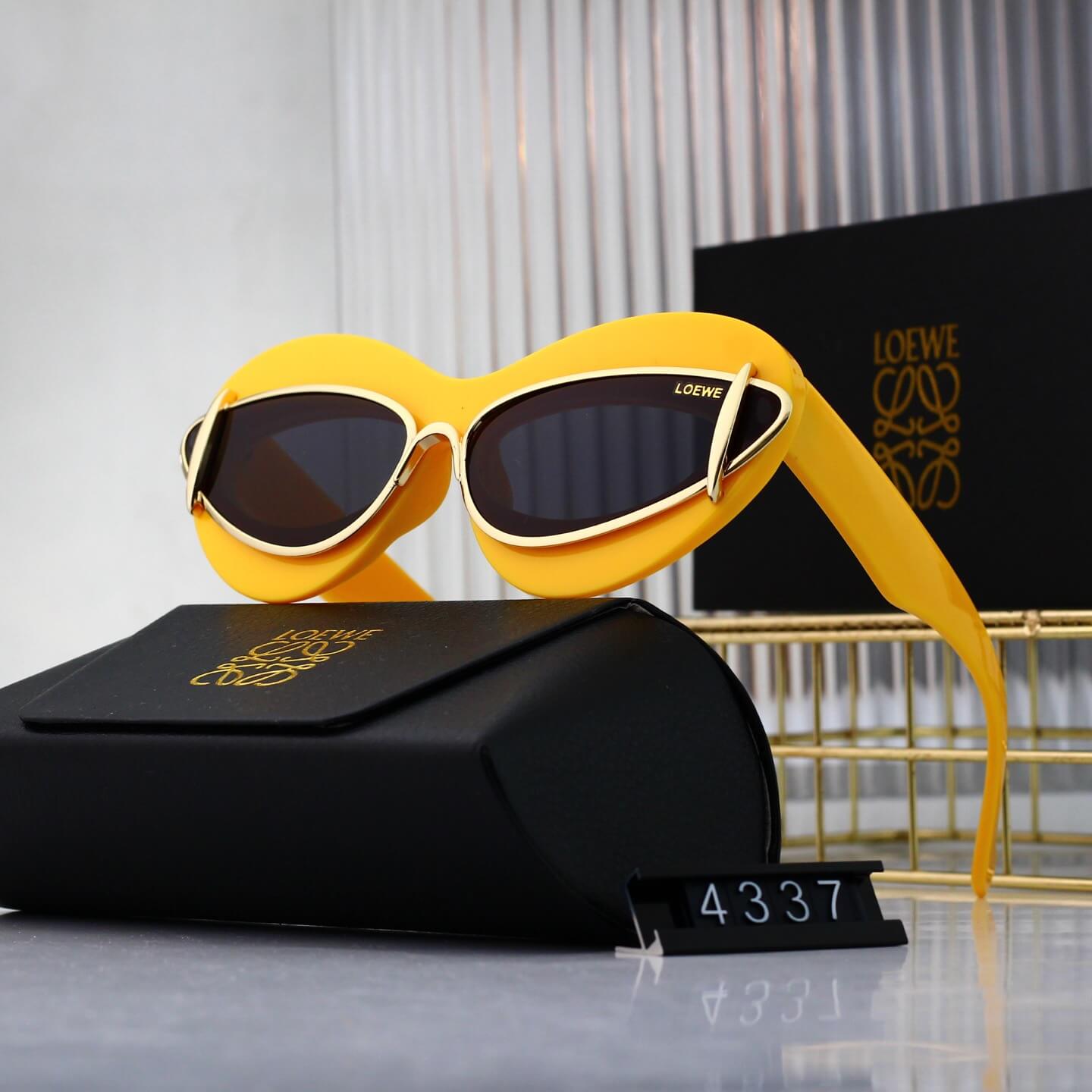 Lunettes de soleil rétro modernes à monture en cœur incrustée