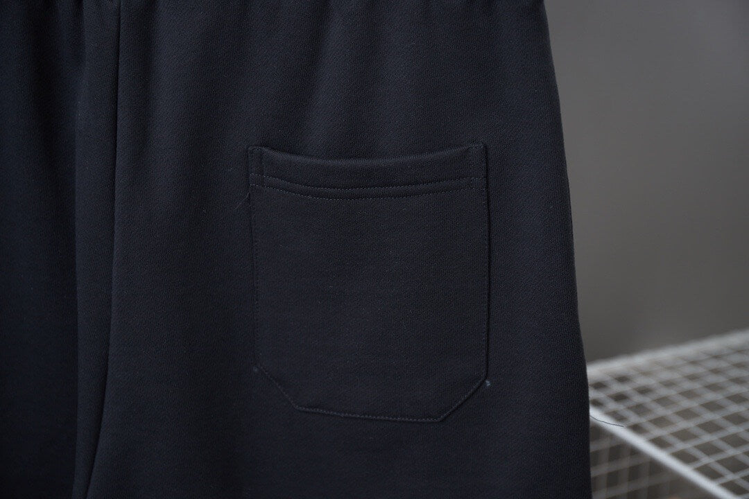 Pantalones cortos con apliques de pétalos
