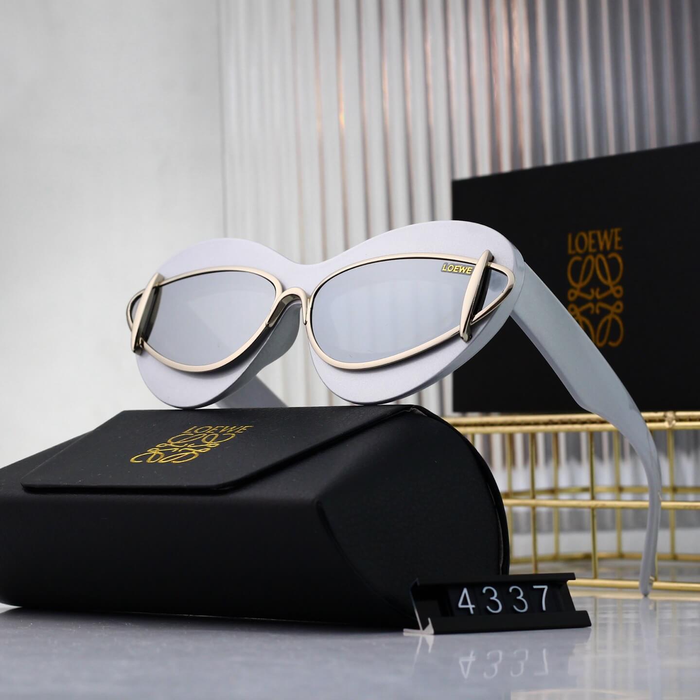 Lunettes de soleil rétro modernes à monture en cœur incrustée