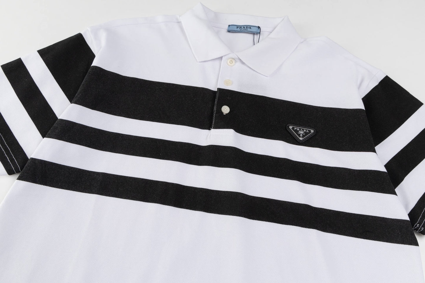 Polo à rayures et coutures