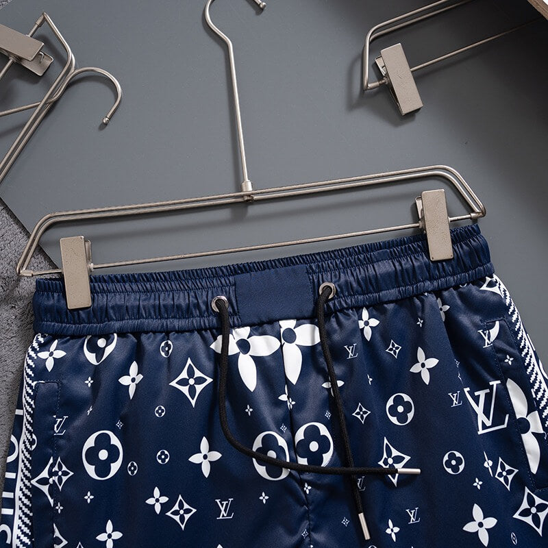Short de plage bleu profond à imprimé intégral