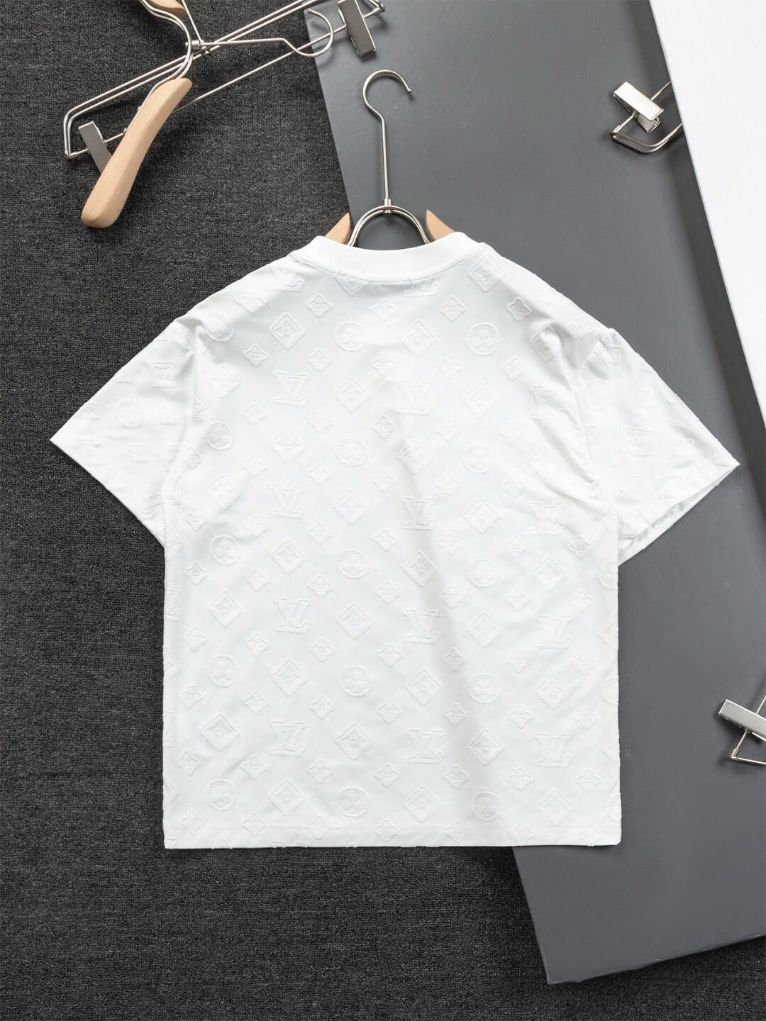 Camiseta llena de preguntas