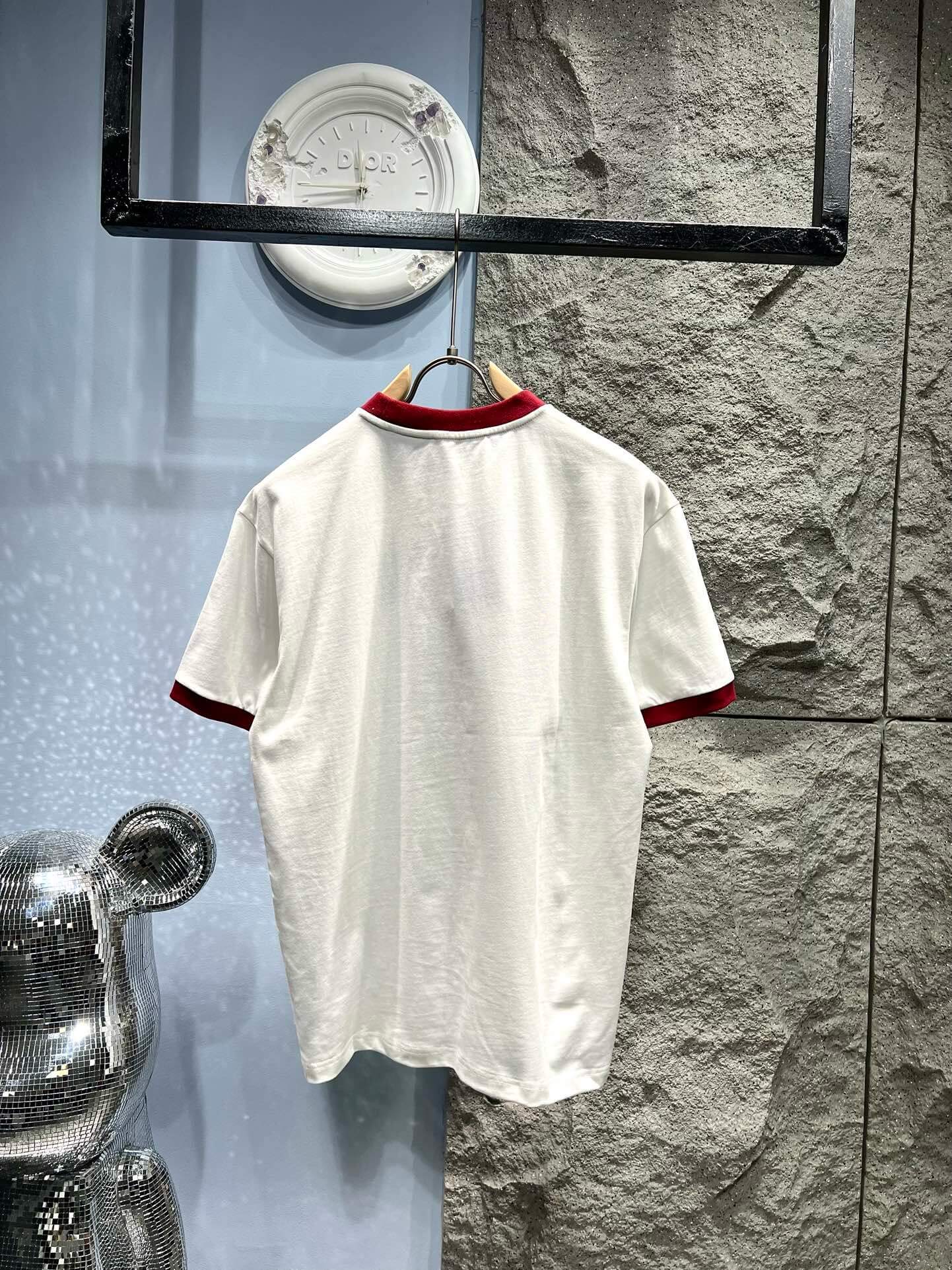 Camiseta de rayas con bordado de doble G