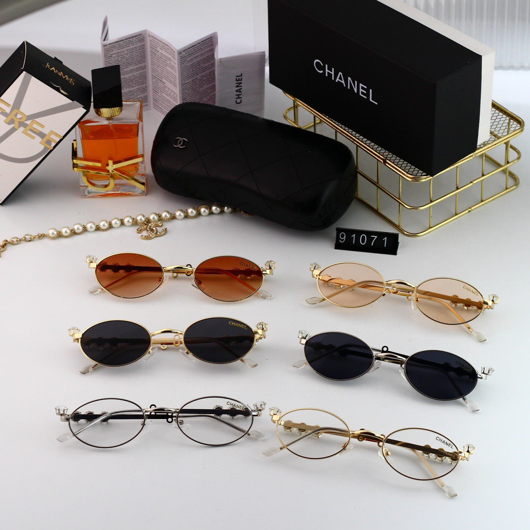 Gafas de sol modernas de metal con montura pequeña