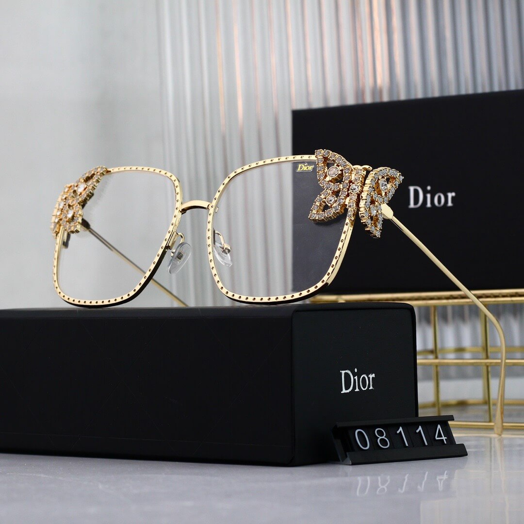 Gafas de sol de mariposa de metal de pasarela
