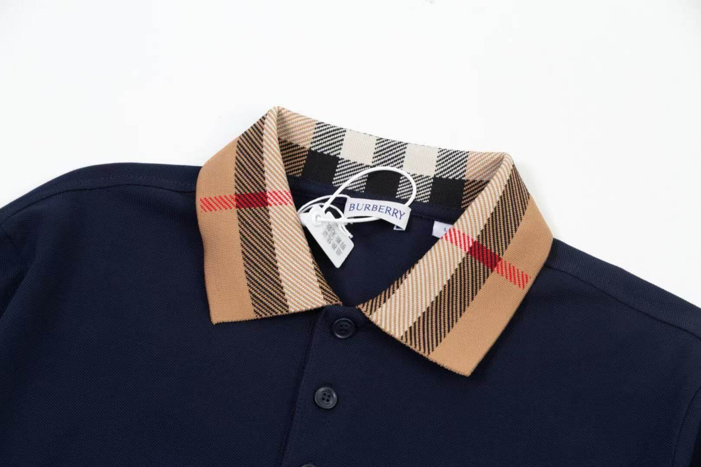 Polo clásico con cuello a cuadros