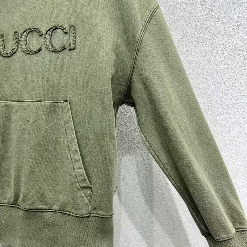 Sudadera con capucha lavada y desgastada