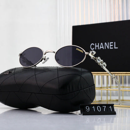 Gafas de sol modernas de metal con montura pequeña