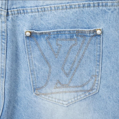 Shorts vaqueros con letras bordadas en el bolsillo