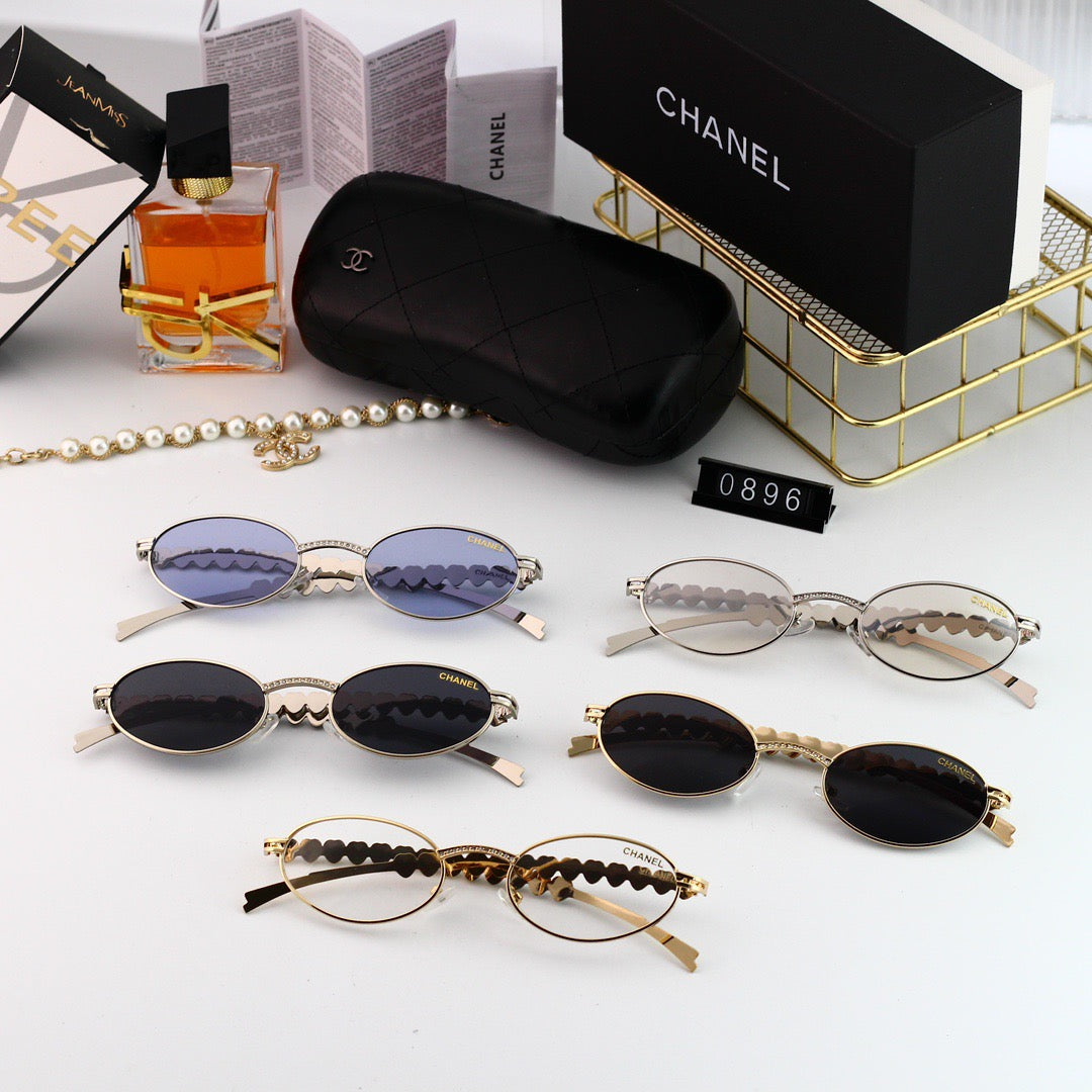 Lunettes de soleil vintage en forme d'œuf avec strass en forme de cœur