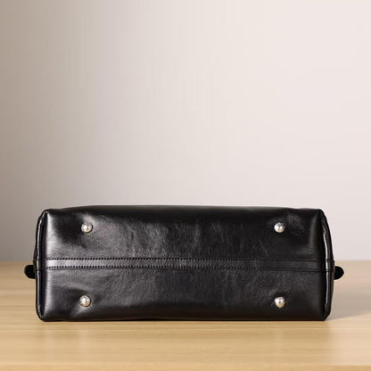 Bolso de hombro negro minimalista de estilo perezoso
