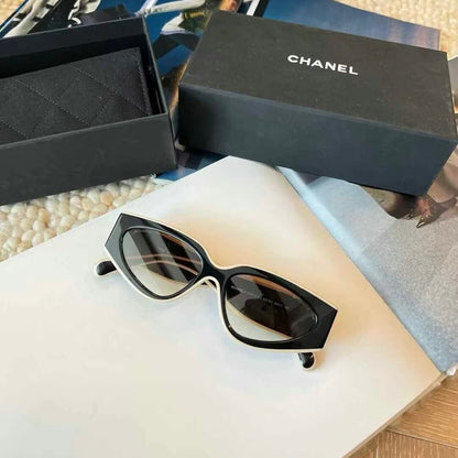 Gafas de sol populares de ojo de gato con montura ancha