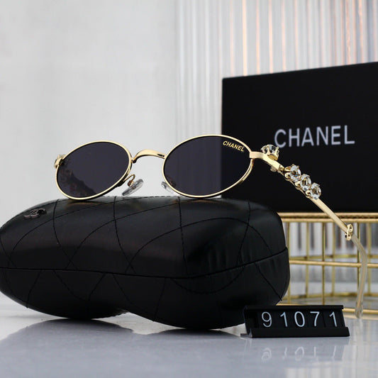 Gafas de sol modernas de metal con montura pequeña