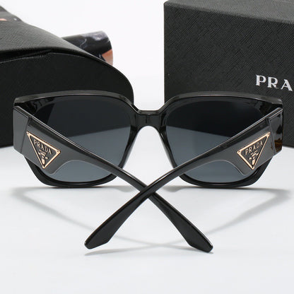 Lunettes de soleil rétro à monture épaisse