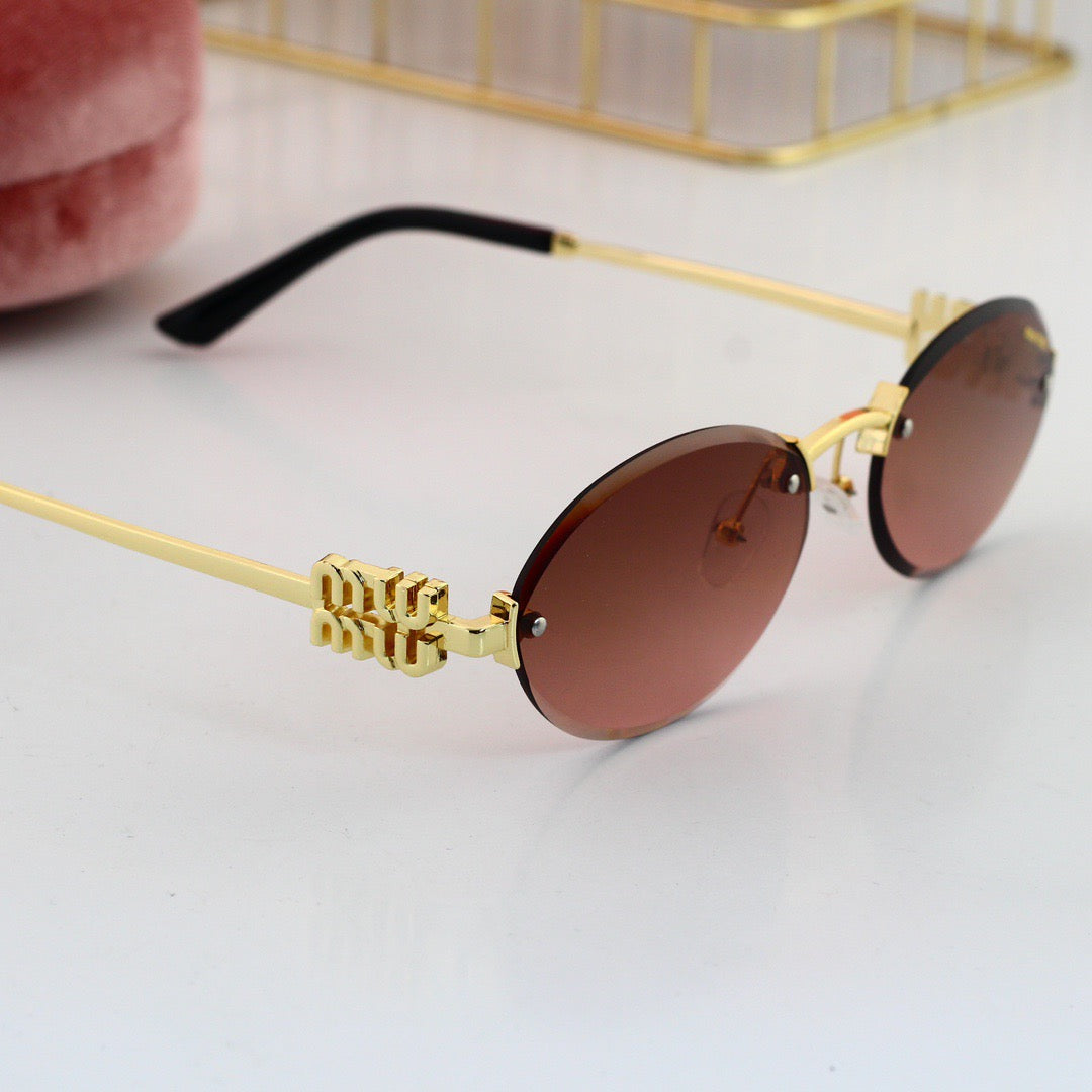 Gafas de sol ovaladas modernas sin marco de metal