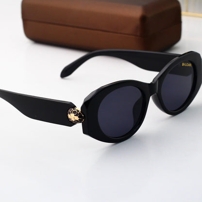 Lunettes de soleil œil de chat chics et rétro à motif serpent