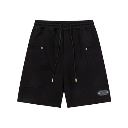 Pantalones cortos con detalle de hebilla turquesa
