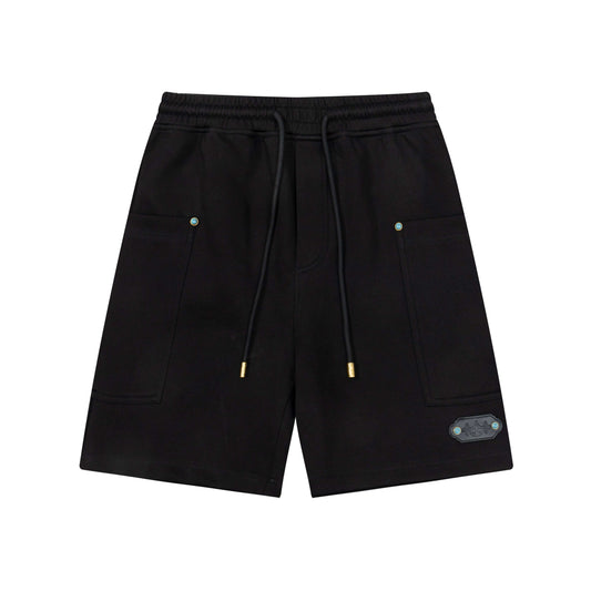 Pantalones cortos con detalle de hebilla turquesa