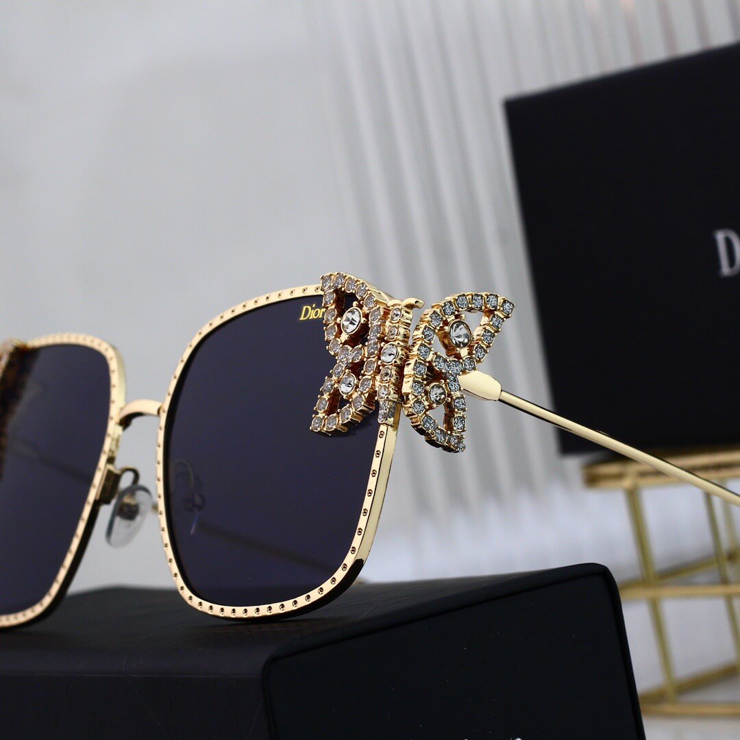 Gafas de sol de mariposa de metal de pasarela