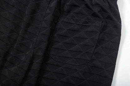 Short brodé triangle