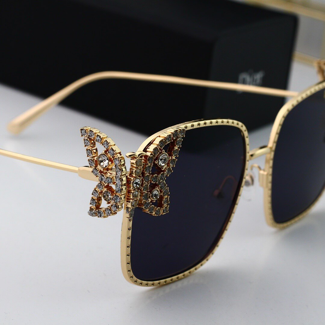 Gafas de sol de mariposa de metal de pasarela