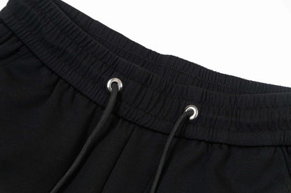 Short brodé à plusieurs lettres