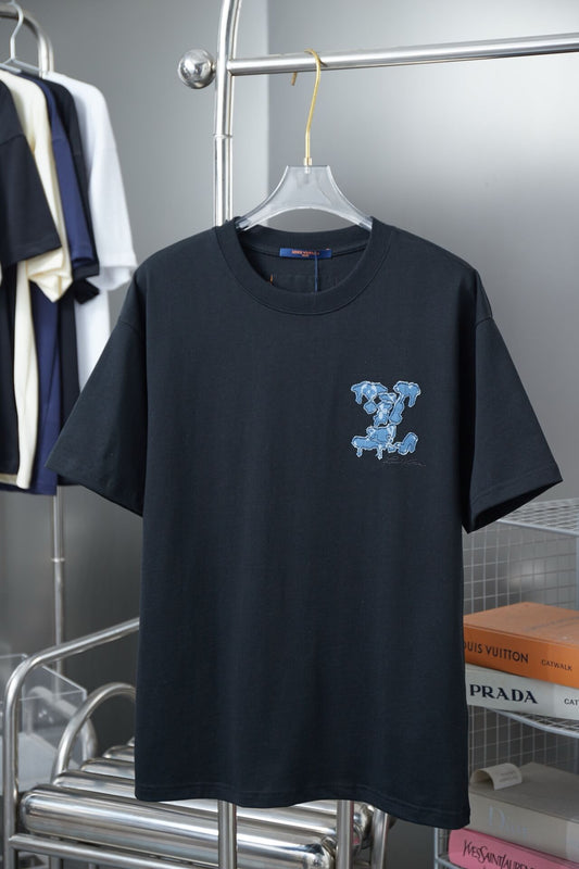 Camiseta vaquera con parches bordados