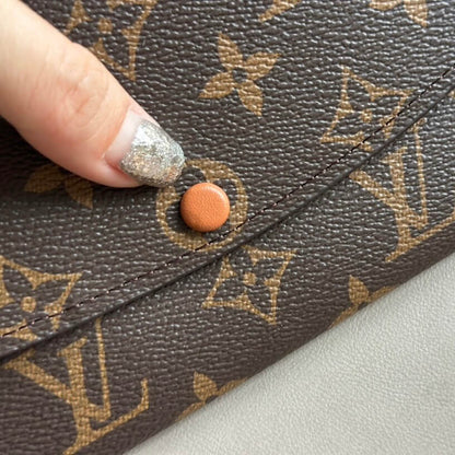 Portefeuille à boucle contrastée et imprimé classique