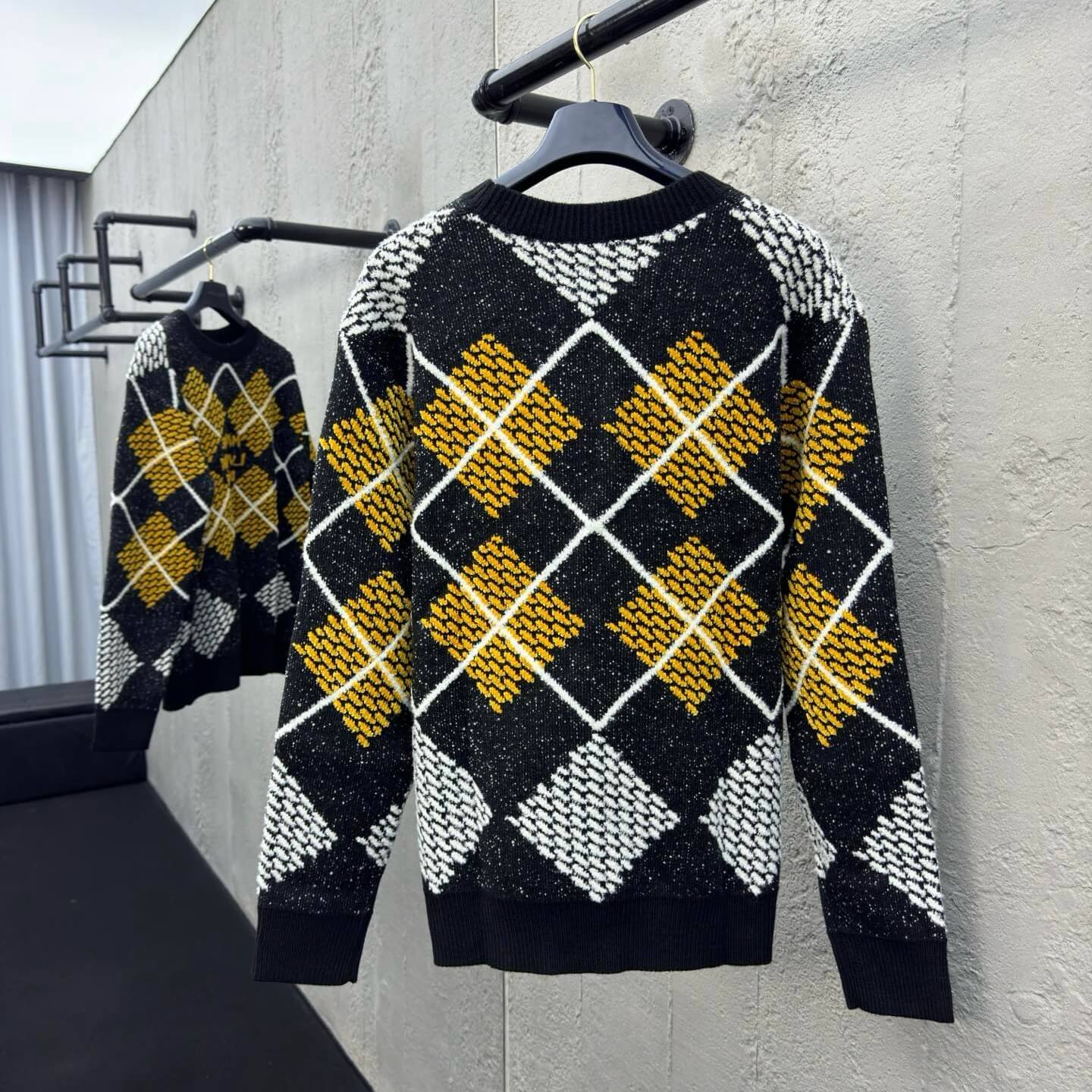 Pull en maille à carreaux chinés