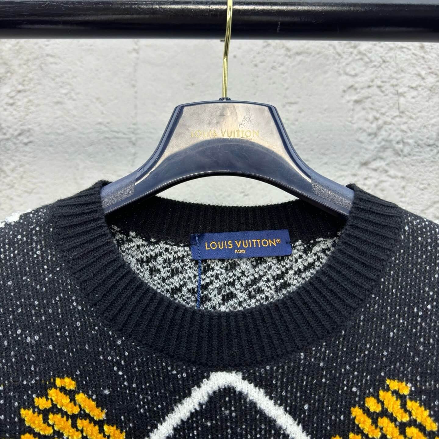 Pull en maille à carreaux chinés