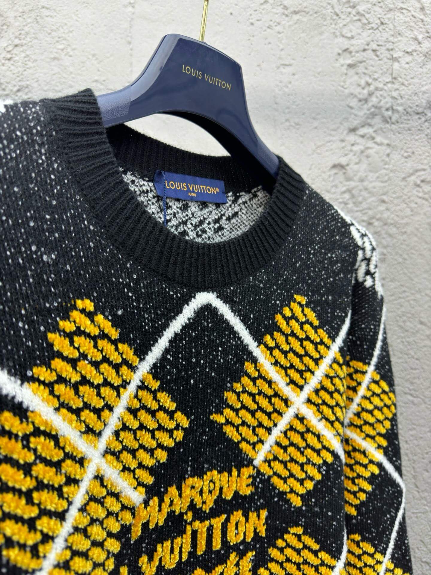 Pull en maille à carreaux chinés