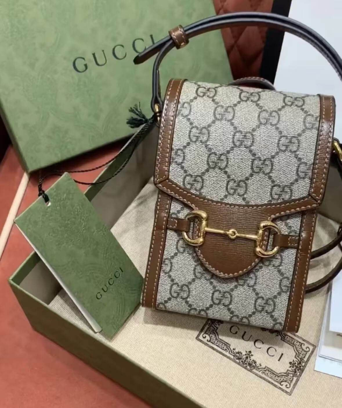 Bolsa para teléfono móvil con monograma de bocado de caballo