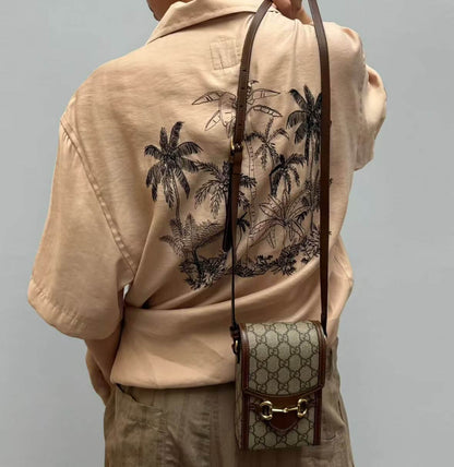 Bolsa para teléfono móvil con monograma de bocado de caballo